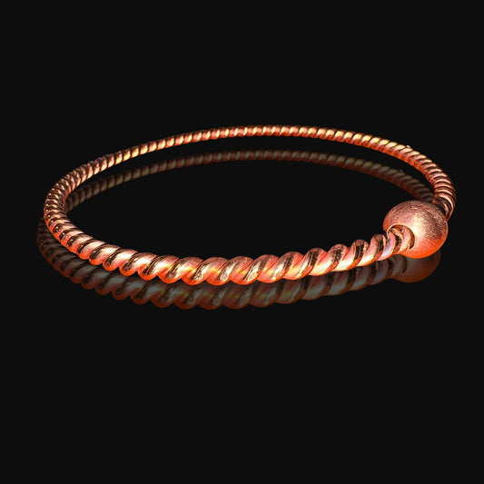 Copper tensor ring with a twisted design on a black background