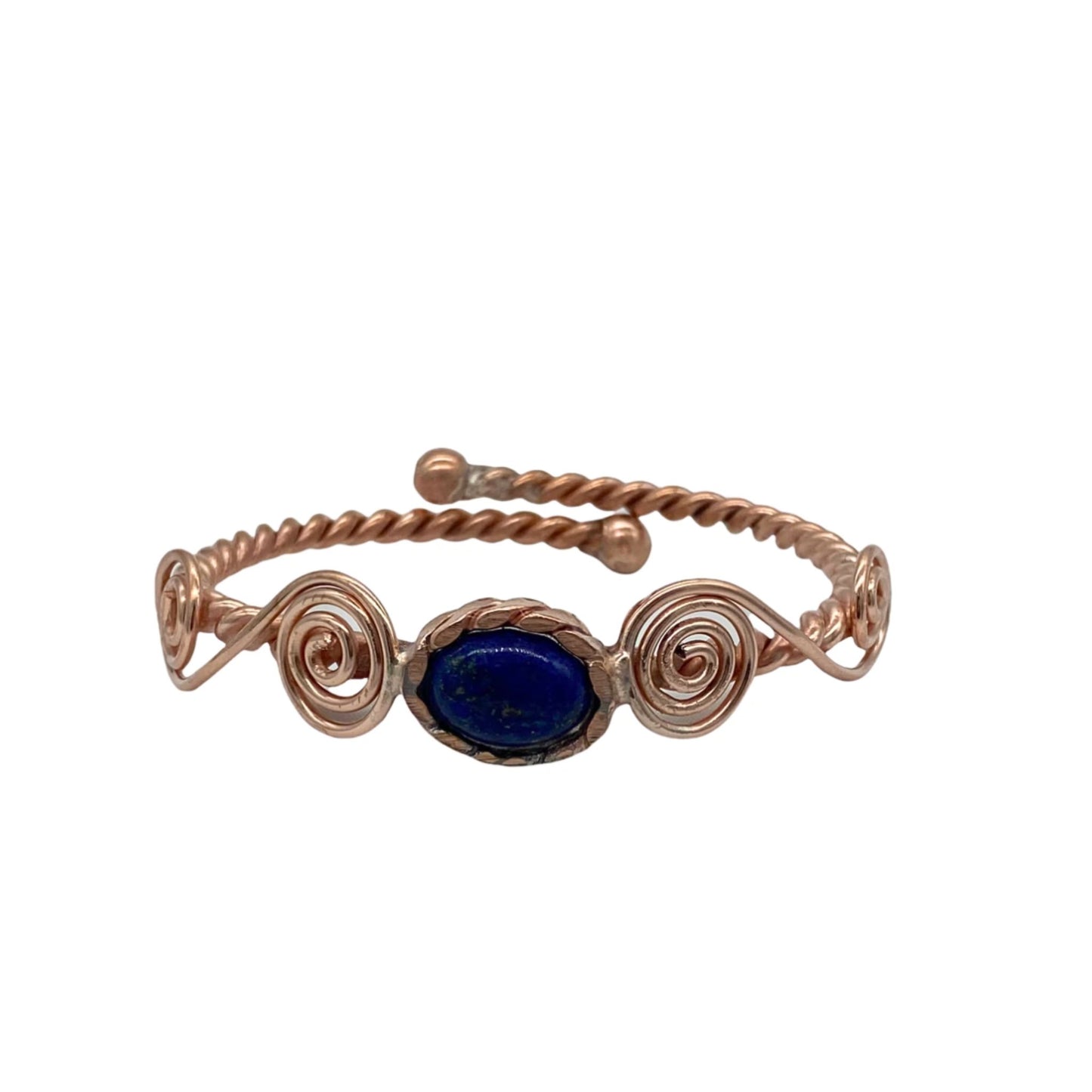 copper wrap bracelet with a blue stone on a white background