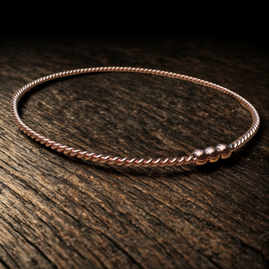  EMF copper ring on a wooden surface