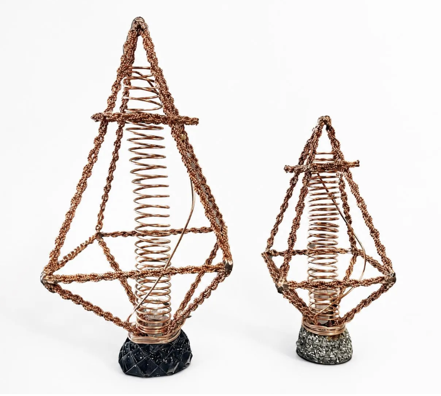 Two copper wire harmonisers EMF protection on a white background