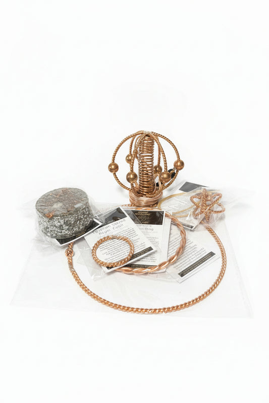 copper harmoniser small sphere sculpture, and plastic-wrapped objects on a white background